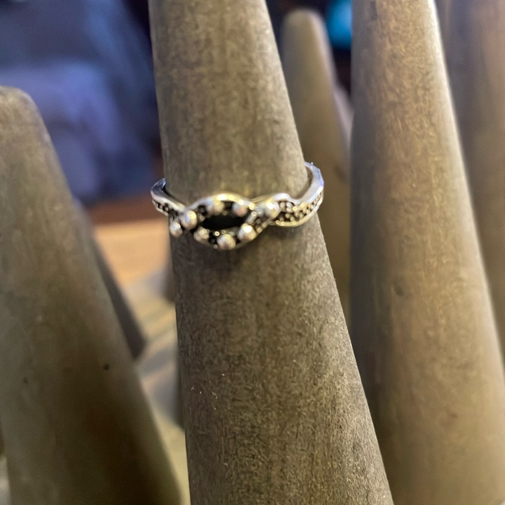 Dotted knot silver tone ring